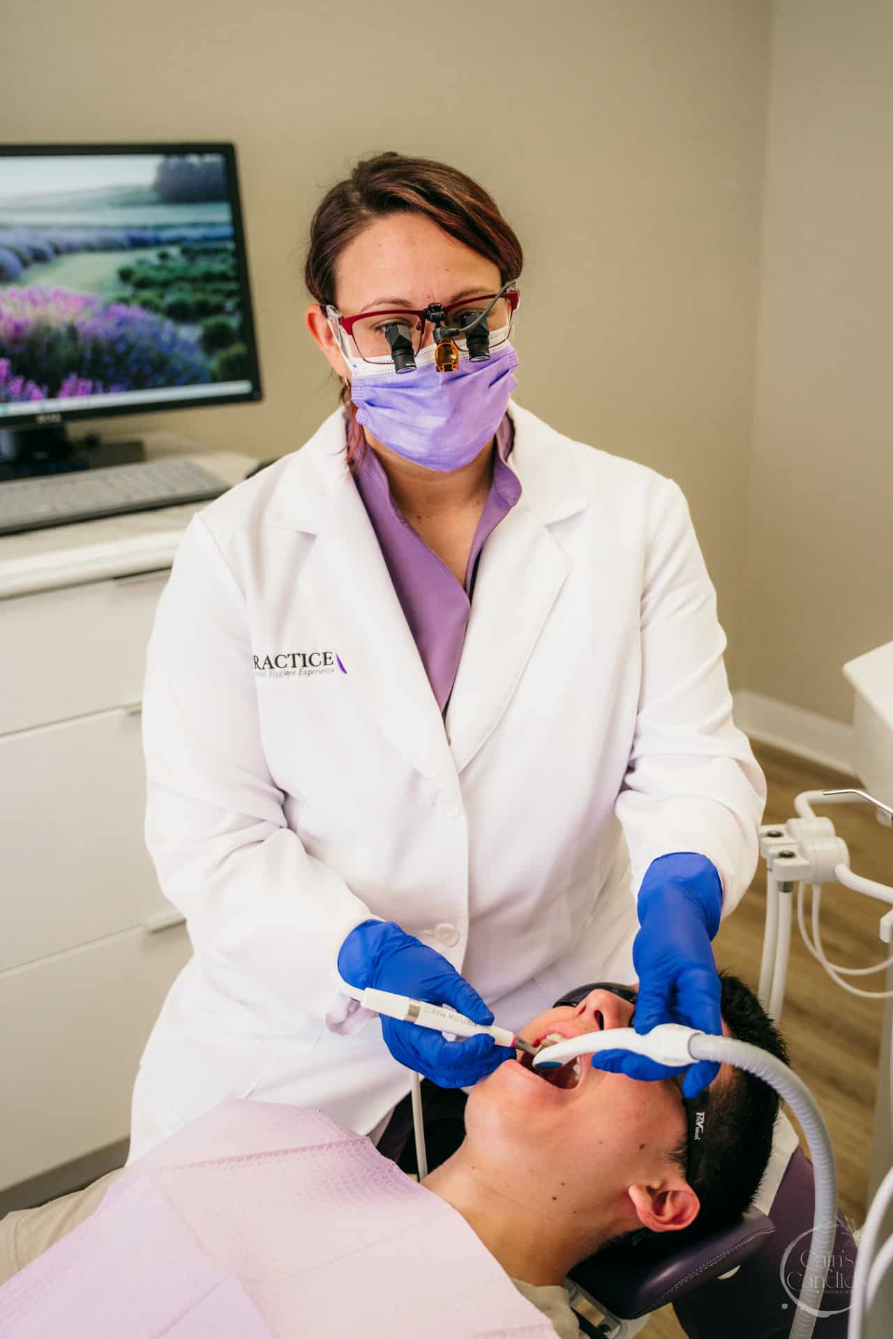 Family brushing teeth together