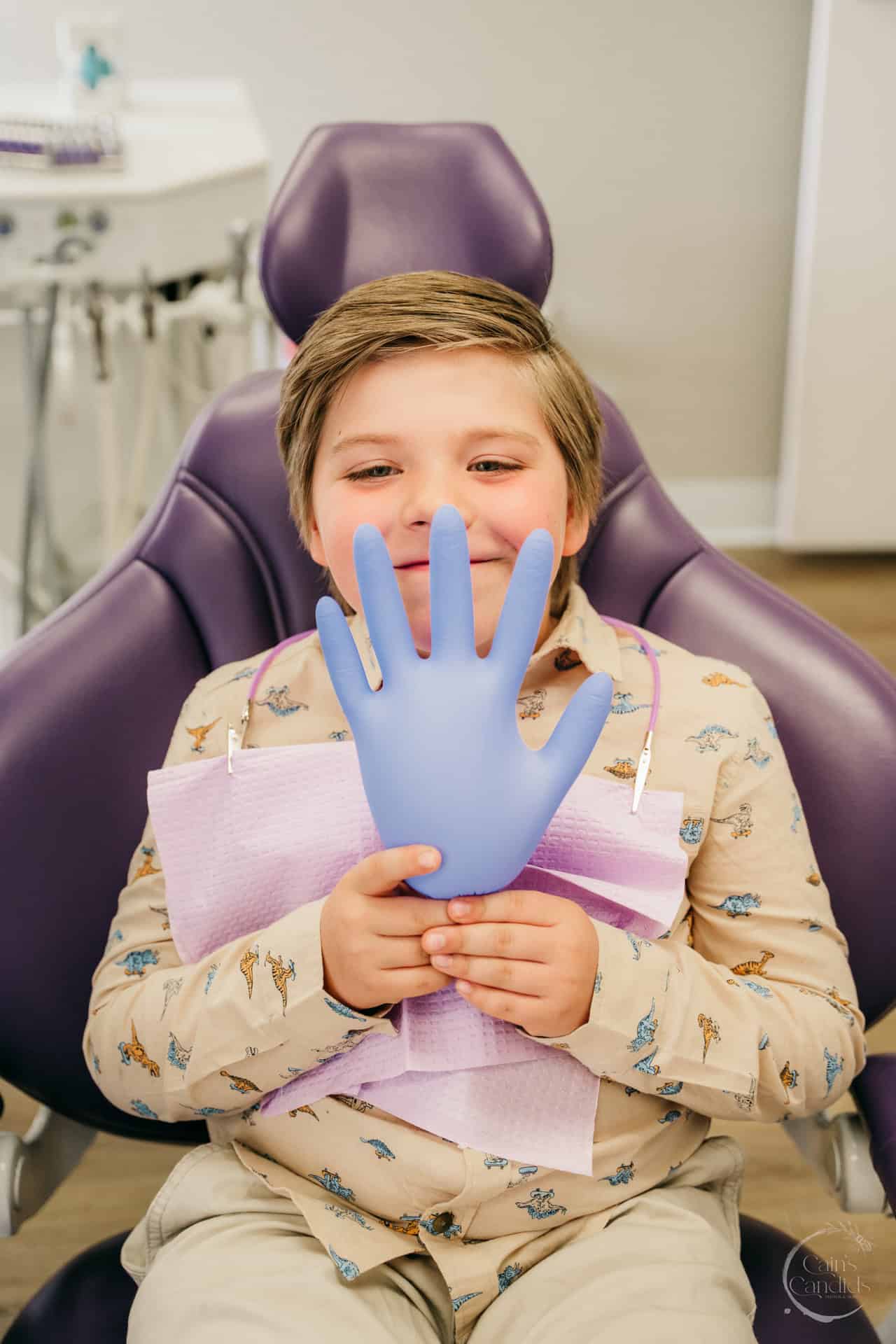 A person holding a toothbrush, symbolizing self-care amid grief during the holidays.