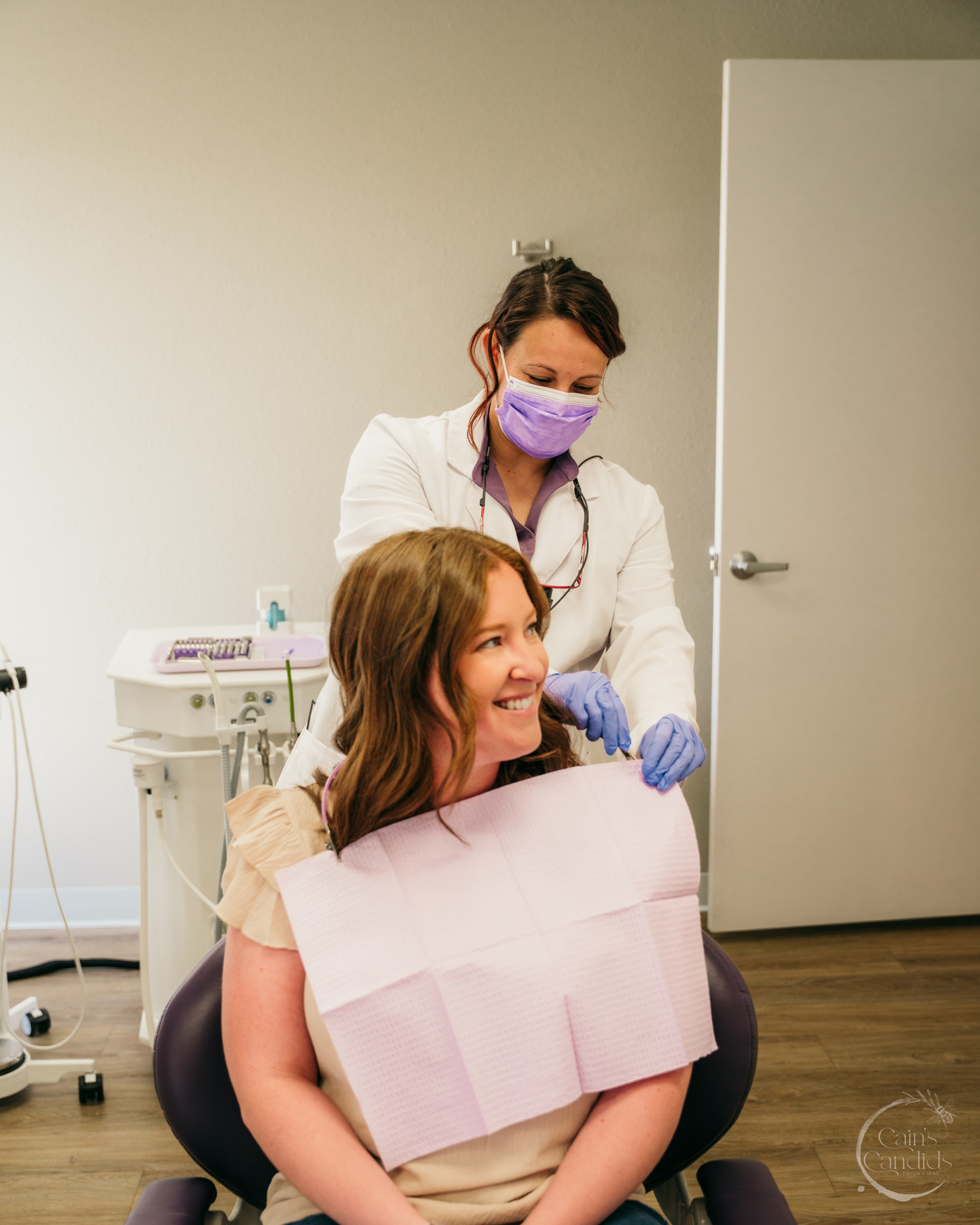 A dental professional providing preventive care to a patient.