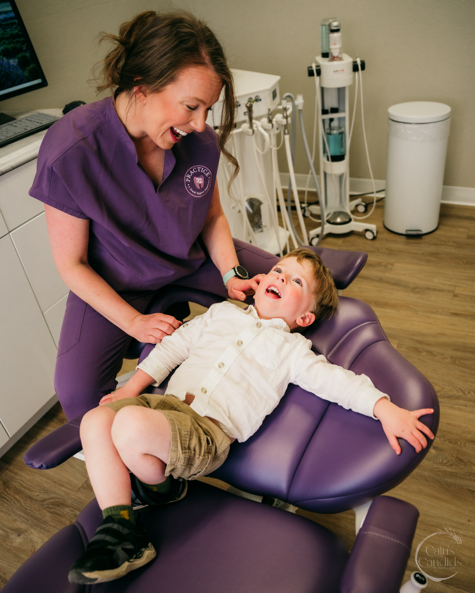 A young child smiling during a dental check-up
