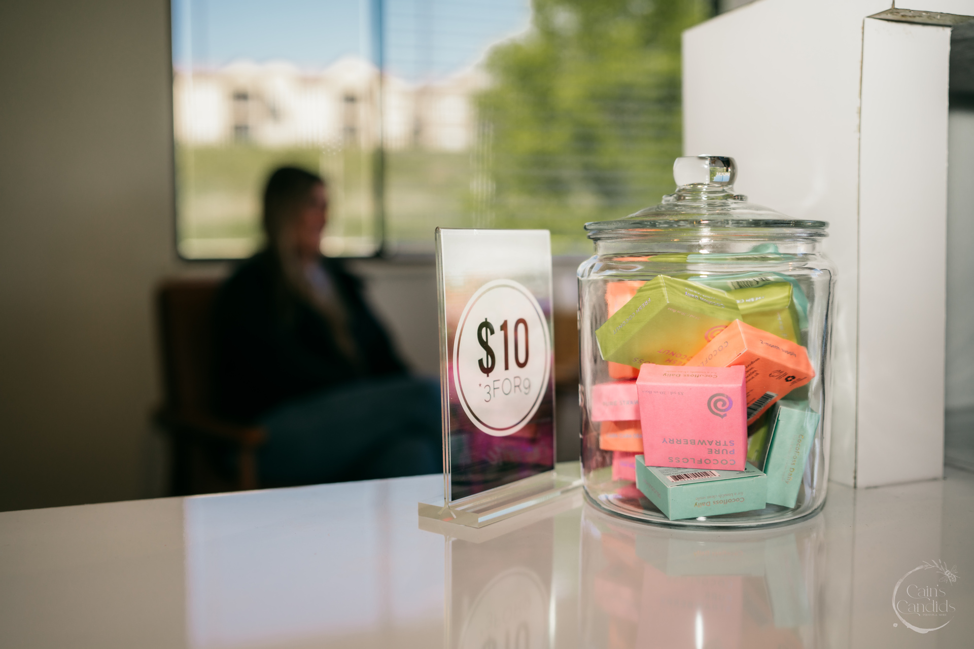 A dental hygienist conducting an assessment on a patient.
