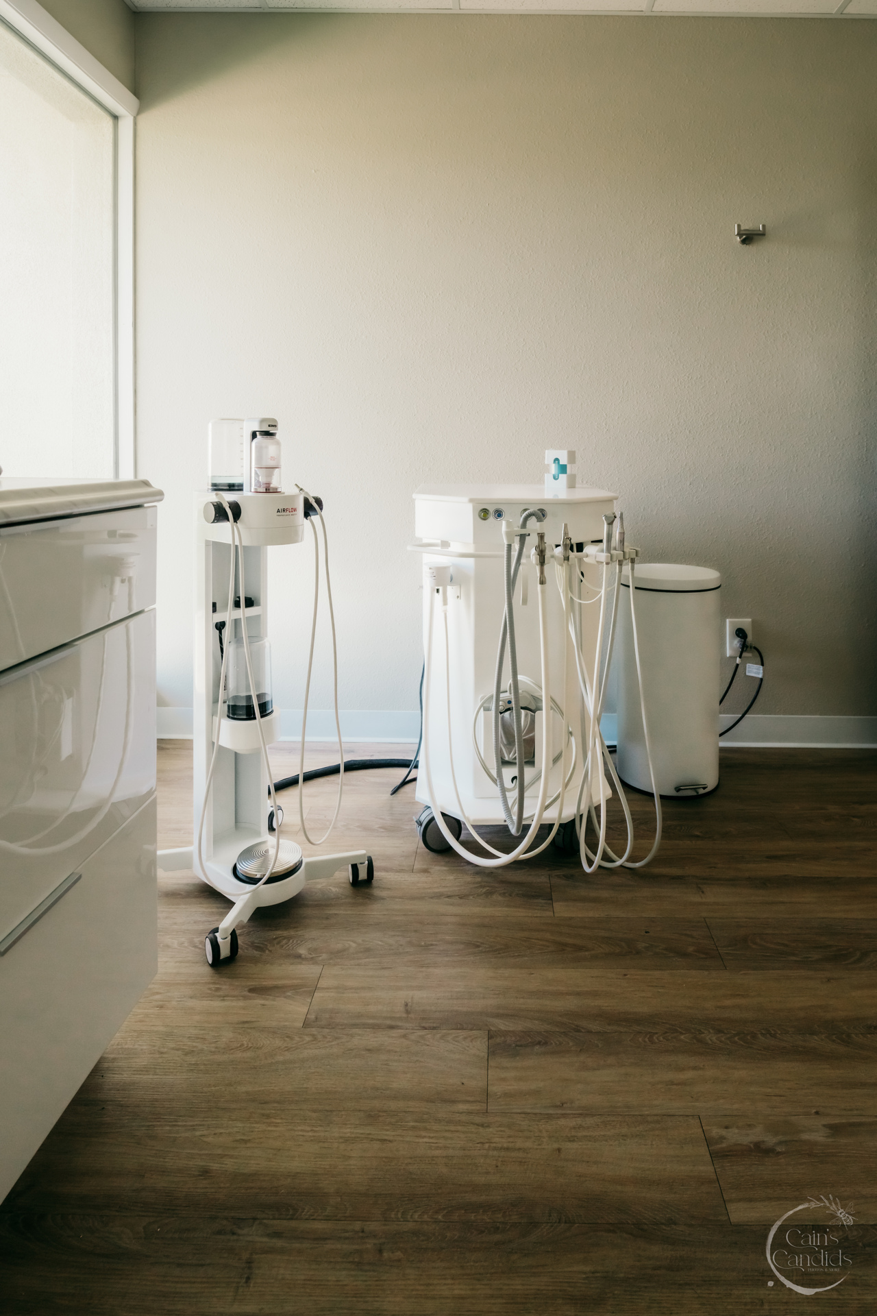 Dental hygienist providing care to a patient in a rural clinic.