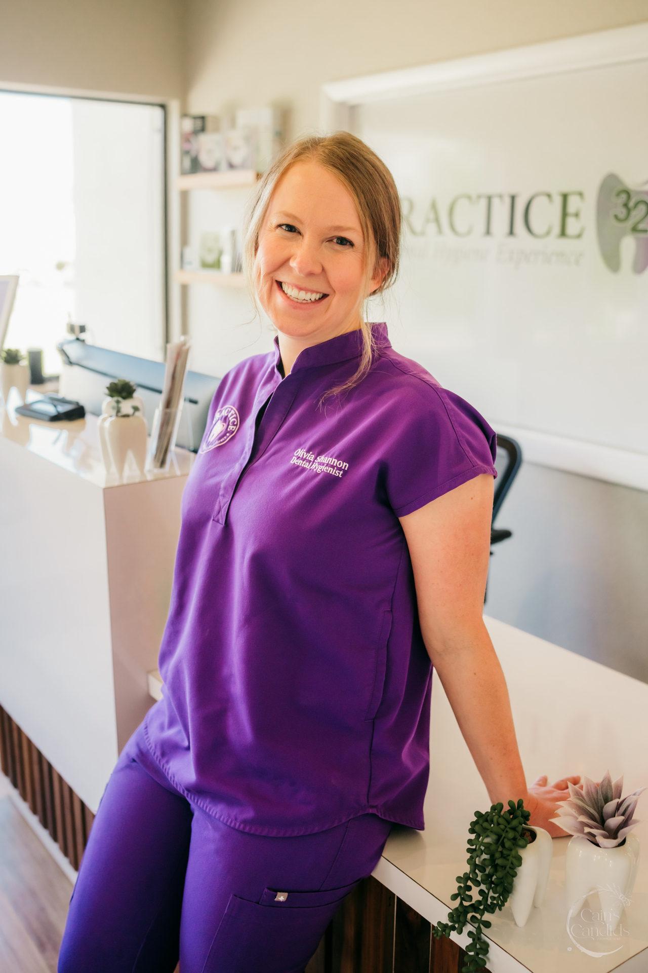 Dental hygienist mentoring student during a clinical session